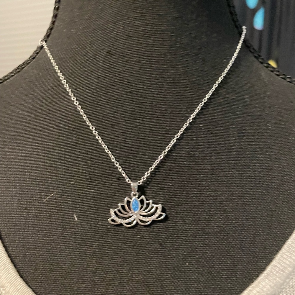 Elegant Silver Lotus Necklace with Blue Detail